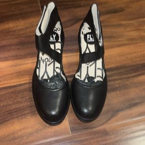 Fly London Black Leather Closed Toe Wedge